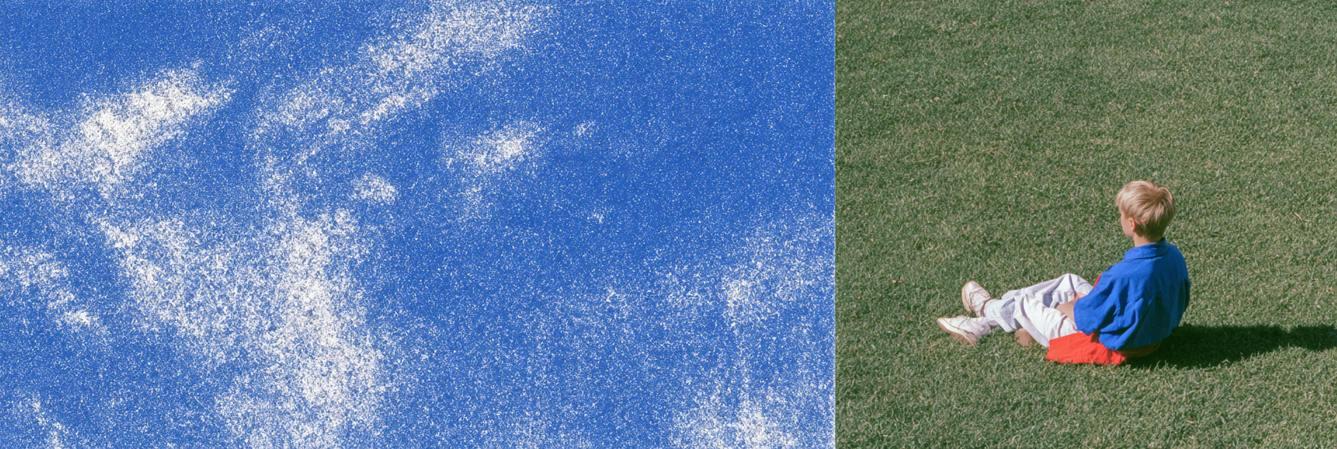 A blue sky beside a child sitting in the grass.